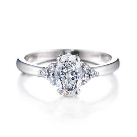 Isla ovaali 6 sivukivellä vihkisormus valkokulta