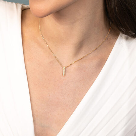 Ikuisuus-riipus keltakulta Yht.0,12ct