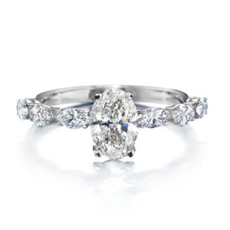 Adalmiina ovaali ja markiisit vihkisormus valkokulta